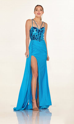 A woman wears the Cecilia Couture 2630 long prom dress—bright blue, form-fitting with a sequin bodice, spaghetti straps, high slit—and high heels, standing against a plain light background.
