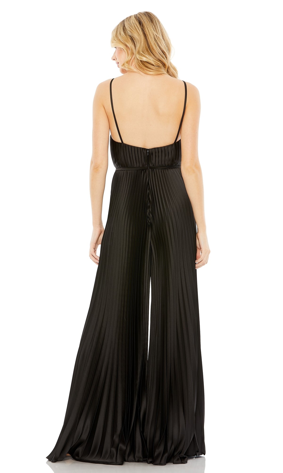 A blonde woman is shown from the back wearing the Mac Duggal Pleated Wide-Leg Formal Jumpsuit 26319, a floor-length, sleeveless black jumpsuit with thin straps, against a white background.