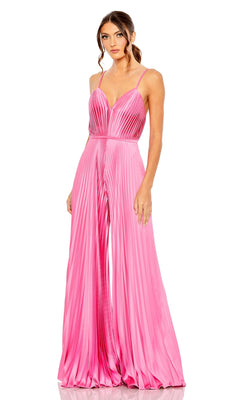 A woman wearing the Mac Duggal Pleated Wide-Leg Formal Jumpsuit 26319—sleeveless, floor-length, pleated, pink with thin straps—stands against a white background.