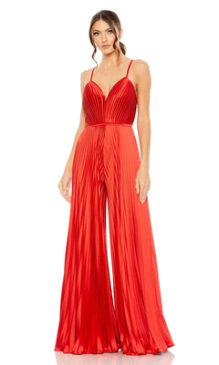 Woman stands against a white background wearing the Mac Duggal Pleated Wide-Leg Formal Jumpsuit 26319, featuring spaghetti straps, sleeveless design, pleats, and wide legs.