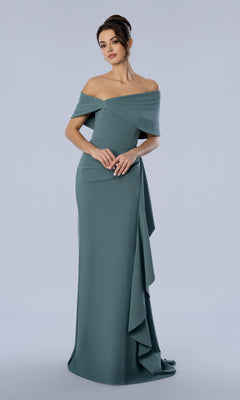 A woman wearing a sage Long Formal Dress: Stella Couture 26372, featuring a floor-length, off-the-shoulder draped bodice and side-slit ruffle detail.
