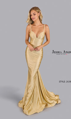 Woman wearing the Empire-Waist Beaded Prom Dress: Jessica Angel 2638, a fitted gold gown with thin straps and a low neckline, standing against a plain gray background.