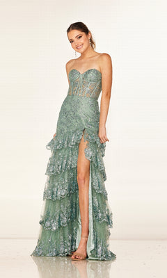 A woman wearing the Cecilia Couture 2642 long prom dress, featuring a strapless corset bodice, sequin accents, ruffled tiered skirt with a high slit, stands smiling against a plain background.