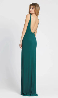 A woman faces away, wearing a sleeveless, floor-length teal Long Formal Dress: Mac Duggal 26434 with a deep open back, set against a plain white background.