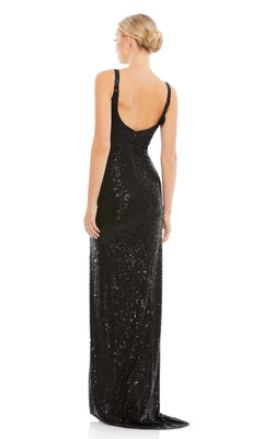 A woman with blonde hair in a low bun wears the Sexy Long Sequin Formal Dress: Mac Duggal 26443, sleeveless and floor-length with a low back, standing and facing away from the camera.