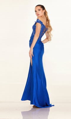 A woman stands sideways against a plain, light background wearing the Cecilia Couture 2645 long prom dress in blue, featuring off-the-shoulder lace details and a delicate lace-up back.