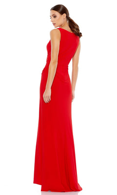 A woman with long brown hair in a low ponytail wears the Mac Duggal 26513 Faux-Wrap Long Formal Dress, sleeveless and floor-length, standing slightly turned to the side against a white background.