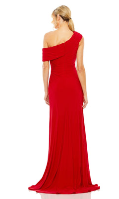 Woman models the Mac Duggal 26517 One-Shoulder Long Prom Dress with ruched detailing, shown floor-length from behind against a white background.