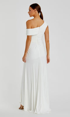 A woman faces away, wearing the Mac Duggal 26517 one-shoulder long prom dress with a fitted bodice and slight train.