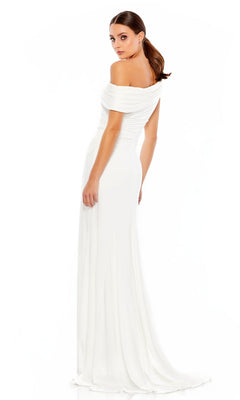 A woman models the Mac Duggal 26517 One-Shoulder Long Prom Dress, standing and looking over her shoulder against a plain white background.