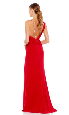Woman wearing the Mac Duggal Asymmetrical Red Formal Dress 265321, a floor-length, backless gown with pearl-beaded strap detailing and a thigh-high slit, standing against a white background.