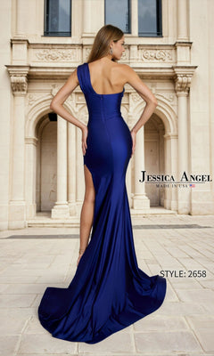 A woman poses outdoors in front of a stone building wearing the fitted, royal blue Long Prom Dress: Jessica Angel 2658, featuring a one-shoulder design, high leg slit, and long train.