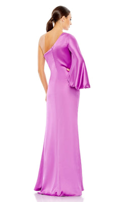A woman faces away, wearing the Mac Duggal 26588: a floor-length, bright pink one-sleeve formal dress with a single flared sleeve.