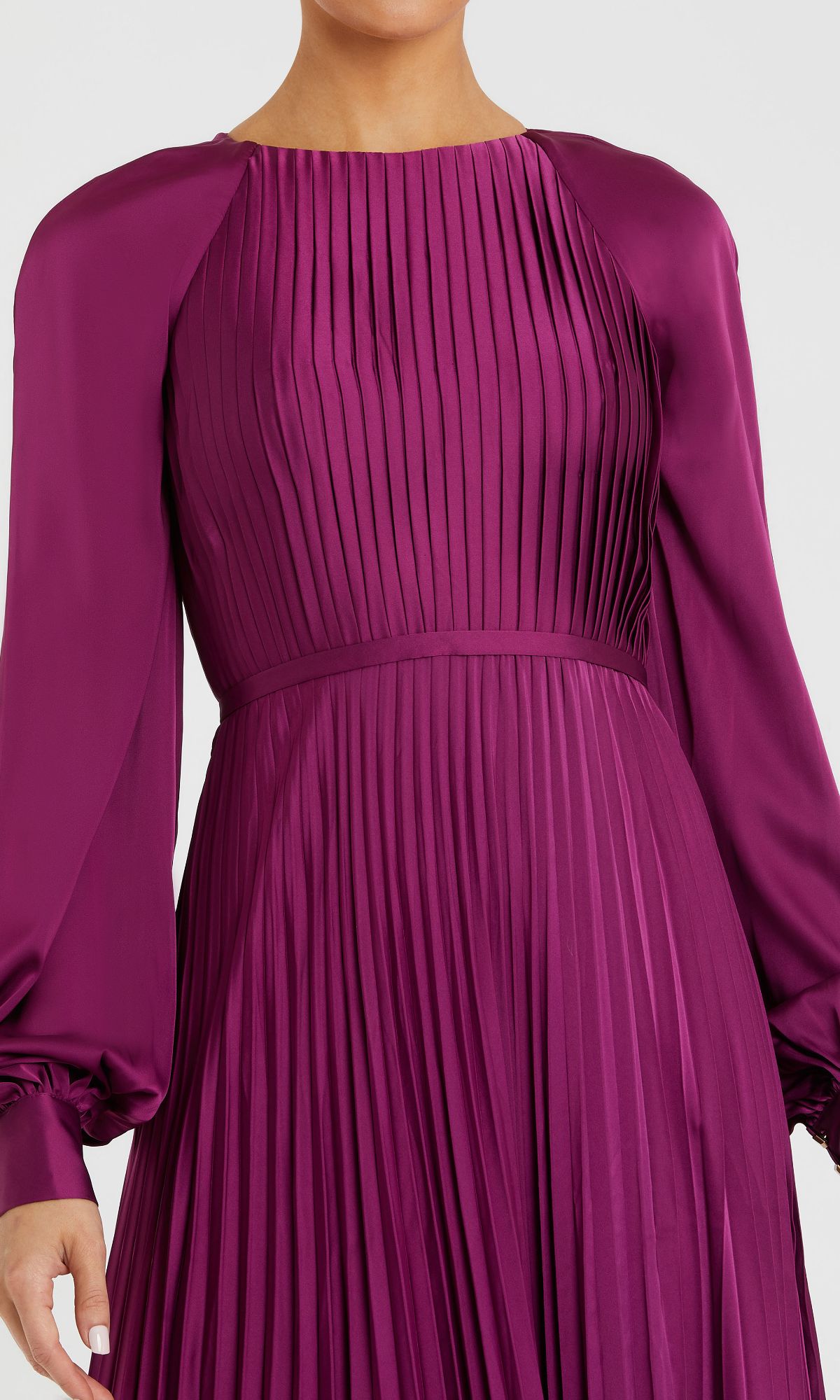 Woman wearing the Mac Duggal 26590 long-sleeved, magenta formal dress with pleats, a fitted waist, and a round neckline; shown from shoulders to below the waist.