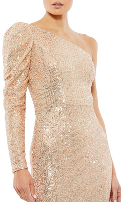 Person wearing the Mac Duggal 26591 One-Sleeve Sequin Formal Dress—a sparkly light gold gown featuring a single long sleeve and fitted silhouette.