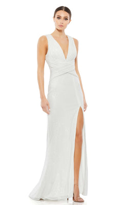 A woman models the Mac Duggal 26598, a sleeveless long formal dress with a deep V-neckline, wrap bodice, and thigh-high slit, paired with high-heeled sandals against a plain white background.