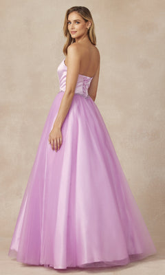 A woman in the Strapless Sweetheart Long Prom Ball Gown 265 with a corset-style back stands slightly turned against a neutral backdrop.