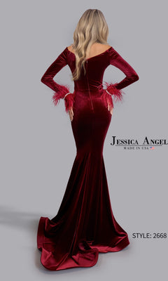 A woman with long blonde hair models the fitted velvet Jessica Angel 2668 long prom dress, featuring an off-the-shoulder mermaid silhouette and feathered cuffs, against a gray background. Text: "Jessica Angel" and "Style: 2668.