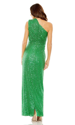 A woman models the Mac Duggal 26694, a green one-shoulder long formal dress, posing with her back to showcase the gown's fitted silhouette and center slit.