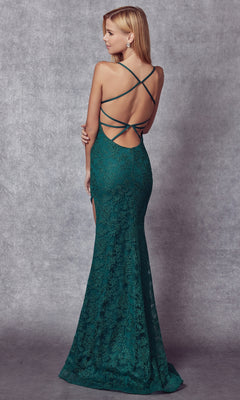 A woman wears the Dramatic Slit Long Embellished Prom Dress 266—a floor-length, dark green, open-back gown with a fitted silhouette and crisscross design—standing against a gray textured backdrop.