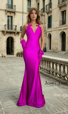 A woman stands outdoors in front of a building, wearing the Jessica Angel 2671 Long Prom Dress in fuchsia, featuring a v-neckline and floor-length fitted style with gloves. Text reads "Jessica Angel Made in USA" and "Style: 2671.