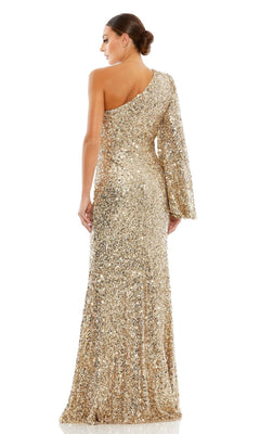 A woman stands with her back to the camera in the Mac Duggal 26717, a gold sequin formal gown featuring one long sleeve—a stunning one-sleeve evening dress perfect for special occasions.