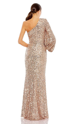 A woman faces away, wearing the Mac Duggal 26717 One-Sleeve Sequin Formal Gown—an elegant, floor-length gold dress with a low ponytail hairstyle, perfect for any special occasion.
