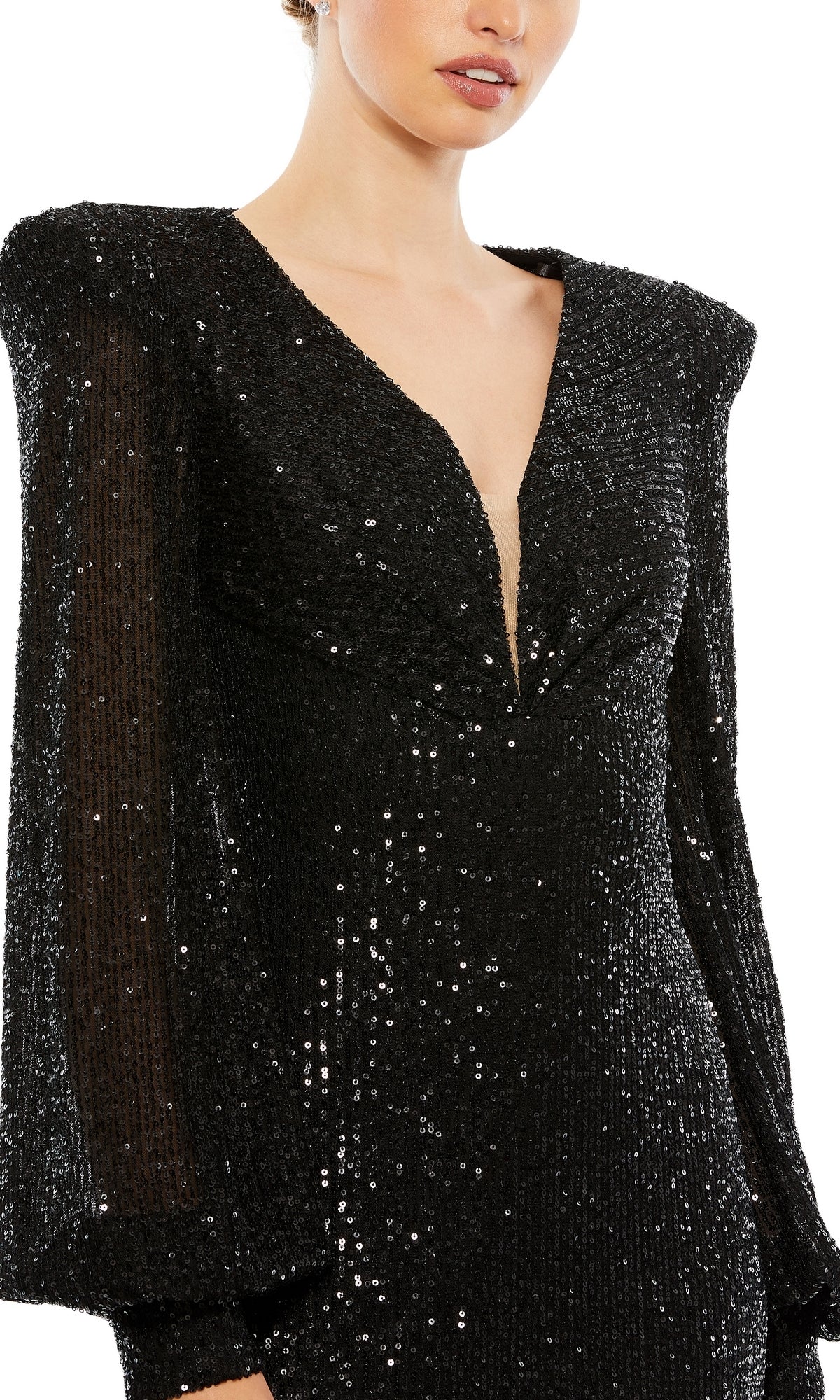 A woman wearing the Long Formal Dress 26722 by Mac Duggal, featuring black sequins, long sheer sleeves, and a deep V-neckline.
