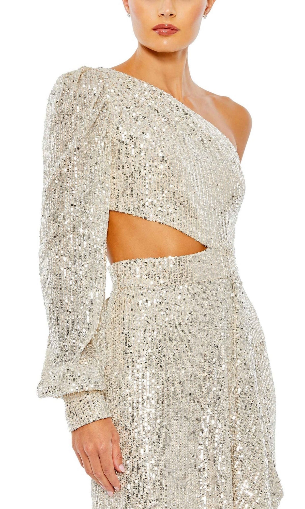 A woman wears the Mac Duggal 26730 Cut-Out Long Sequin Formal Dress, a shimmering silver one-sleeve gown with striking waist cutout.