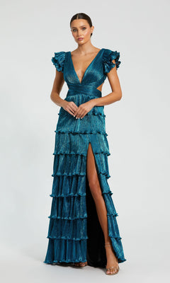 A woman poses against a plain light background in the Mac Duggal Open-Back Tiered Formal Dress 26740, featuring a teal hue, flutter sleeves, deep V-neckline, lace-up open back, tiered ruffles, and a high slit.