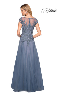 A woman stands with her back facing the camera, showcasing La Femme 26893—a floor-length, short-sleeve blue gown featuring a lace embroidered bodice and sheer upper back. This elegant long formal dress exudes sophistication, ideal for any special occasion. The “La Femme” logo is displayed in the top right corner.