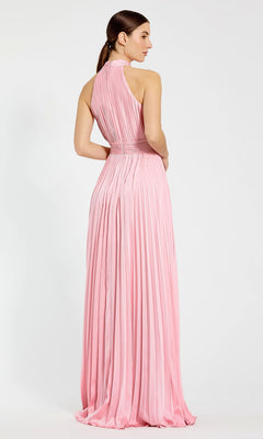 A woman stands with her back to the camera against a plain background, wearing the Long Pleated A-Line Formal Dress: Mac Duggal 26992—sleeveless, floor-length, and light pink.