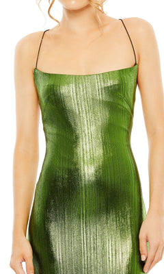 A person models the Mac Duggal 27061 Strappy-Back Metallic Prom Gown in shiny green with thin black straps against a plain white background.