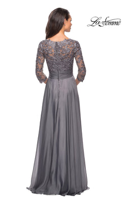 Back view of the grey chiffon La Femme 27153 formal dress, featuring a lace bodice, three-quarter length sleeves, and a pleated waistband.