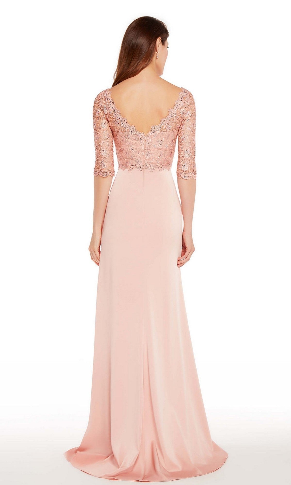 A woman faces away, wearing the Alyce 27242 long formal dress in pink with a beaded lace bodice, half sleeves, and a deep V-back.