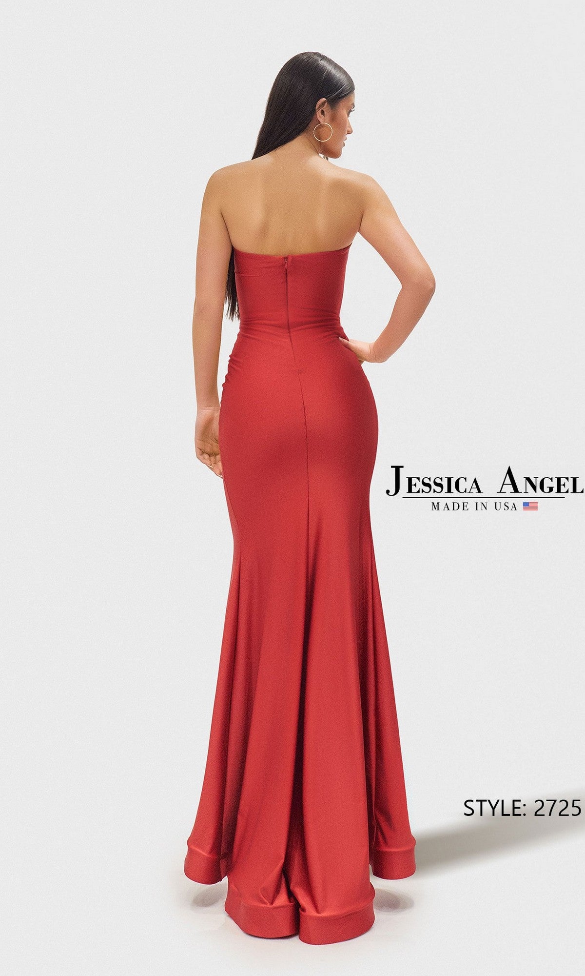 A woman stands with her back to the camera, wearing the Jessica Angel 2725 long strapless jersey prom dress with a fitted silhouette and slight train. Text reads 