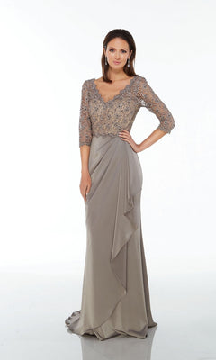 A woman stands against a plain white background, modeling the Alyce 27260 long formal dress in charcoal—a stretch crepe gown with a lace, beaded bodice and three-quarter sleeves, ideal as a mother-of-the-bride dress.