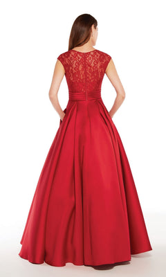 A woman is shown from the back wearing the Alyce 27278 long formal dress, which features a floor-length skirt, beaded lace bodice, and cap sleeves, standing against a white background.