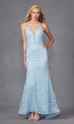 A woman poses against a gray background wearing the Embroidered-Lace Long Beaded Prom Dress 272—a light blue, floor-length, sleeveless gown with thin straps, a deep V neckline, open back, and delicate embellishments.