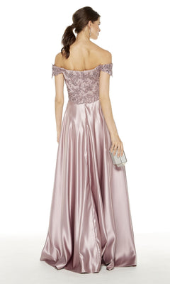 A woman in the Alyce 27393 long formal dress, a mauve off-the-shoulder satin gown with a lace bodice, stands facing away and holds a silver clutch against a plain white background.