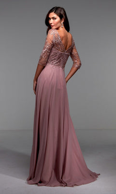 A woman models the Alyce 27475 long formal dress with a mauve lace bodice, sheer sleeves, and open back—a stunning mother-of-the-bride option.