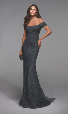 Woman in a charcoal Alyce 27484 long, off-the-shoulder fitted formal lace dress holds a clutch, standing against a plain gray background.