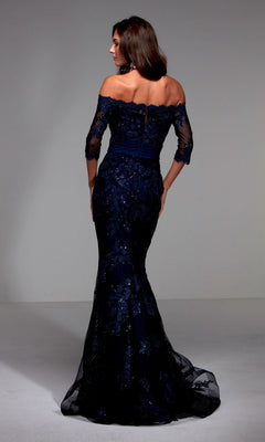 A woman poses with her back to the camera in the Alyce 27495, a navy blue, beaded lace off-the-shoulder mermaid gown with three-quarter sleeves—an elegant choice for mothers of the bride.