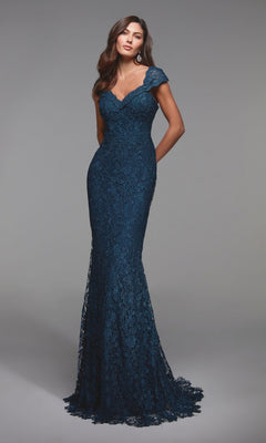A woman in the Alyce 27496 long formal dress in Blue Opal, featuring a fitted mermaid silhouette with shimmering lace and cap sleeves, stands against a plain gray background.