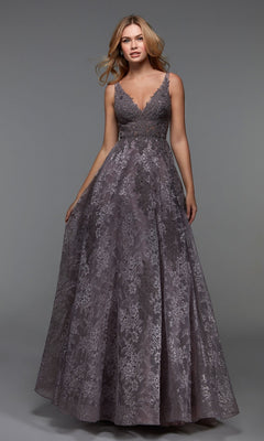 A woman wears the Alyce 27552 long formal dress in Purple Haze, a sleeveless, floor-length gown with a fitted lace bodice and full floral-patterned A-line skirt. She stands facing forward against a plain gray background.