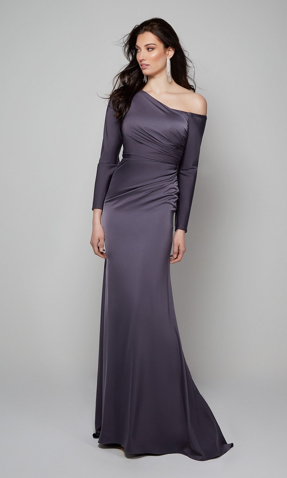 Woman wearing the Alyce 27557 long, fitted, off-the-shoulder dark gray formal dress with long sleeves, standing against a plain light background.