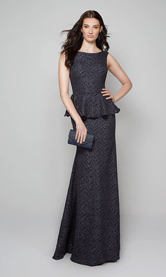 A woman poses in the Alyce 27579 long formal dress in midnight, featuring a sleeveless design, jacquard fabric, peplum waist, and floor-length hem, holding a matching clutch against a plain light background.