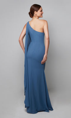 A woman models the Alyce 27603, a long blue one-shoulder chiffon dress with draped detail, standing against a plain gray background—an elegant formal choice for a mother-of-the-bride look.