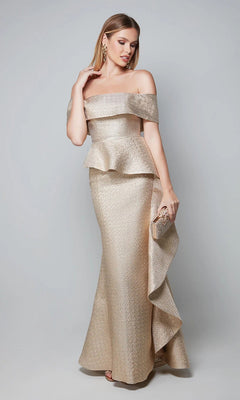 A woman in the Alyce 27612 long formal dress—an off-the-shoulder metallic gold gown with peplum waist and ruffle detail—holds a clutch bag. This glamorous style is ideal for mother-of-the-bride occasions.