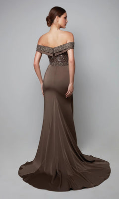 Woman in the Alyce 27619 long formal dress with an off-the-shoulder beaded bodice and flowing train, posing against a plain gray background—the perfect sophisticated mother-of-the-bride dress.